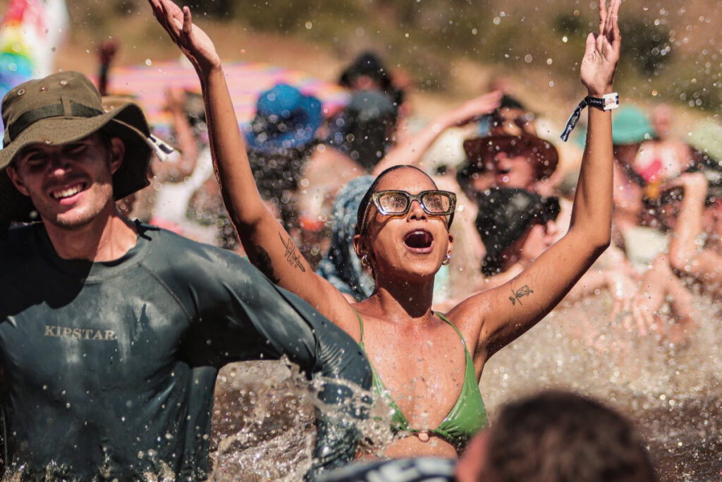 Up the Creek — music, river swims and carefree summer energy, as demonstrated by this lovely sunbather