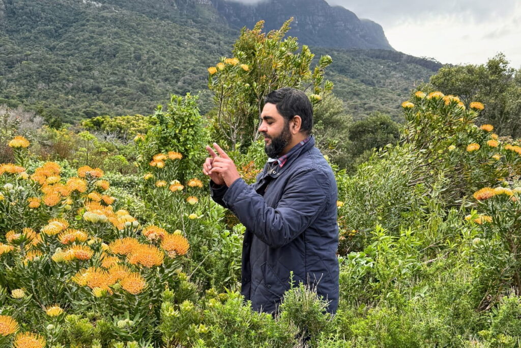 Ismail Ebrahim, head of the Custodians of Rare and Endangered Wildflowers at SANBI, in Kirstenbosch Gardens, In Cape Town, South Africa