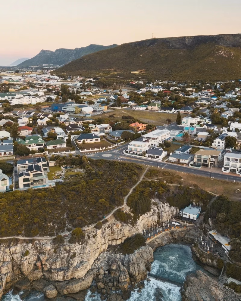 Aerial view of Fick's Pool, the Hermanus Cliff Path and Marine Drive with One Marine Drive Boutique Hotel above