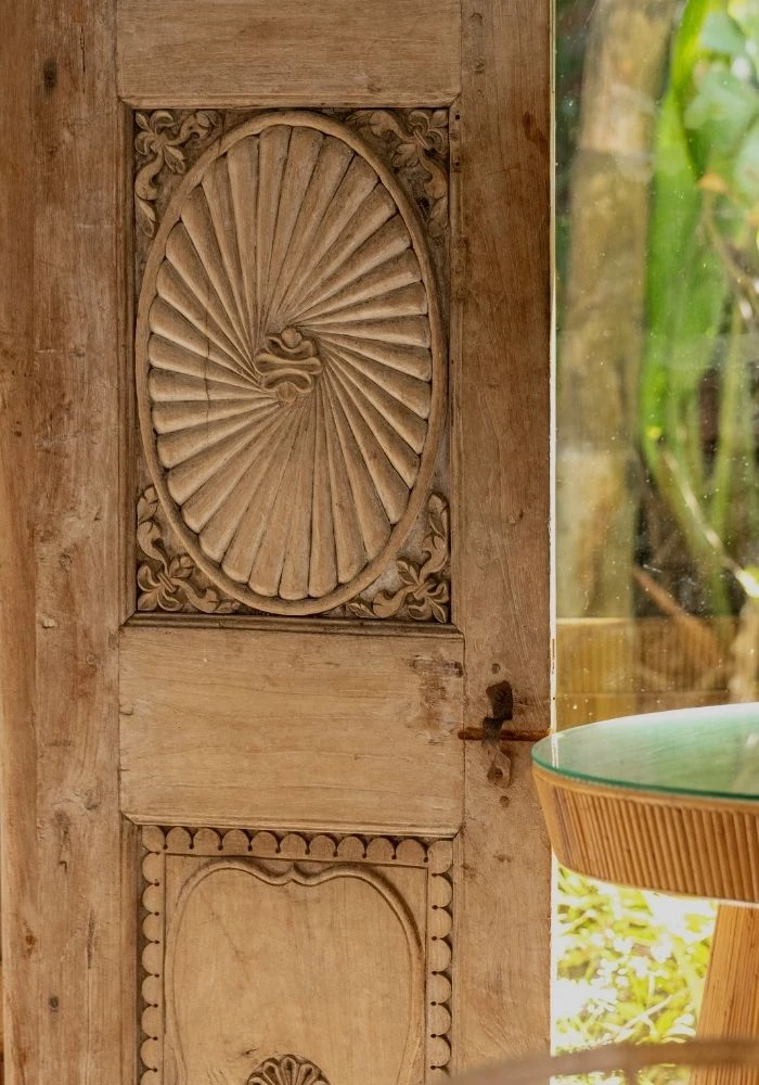Hand-carved Zanzibari-style wooden door at the entrance of Sala Beach House, Ballito