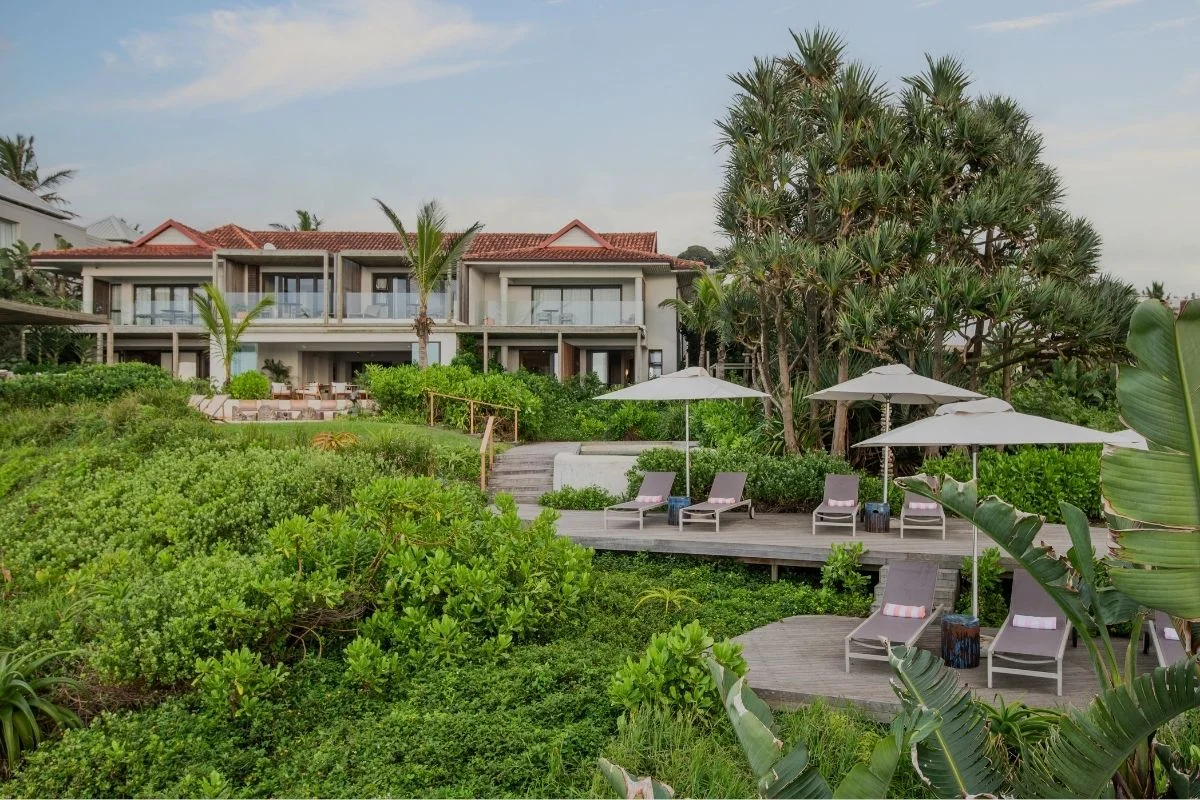 Sala Beach House's double-storey boutique hotel building with two pool decks, Ballito